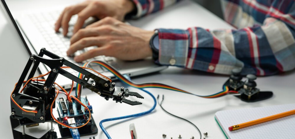 engineer working on robotics automation project