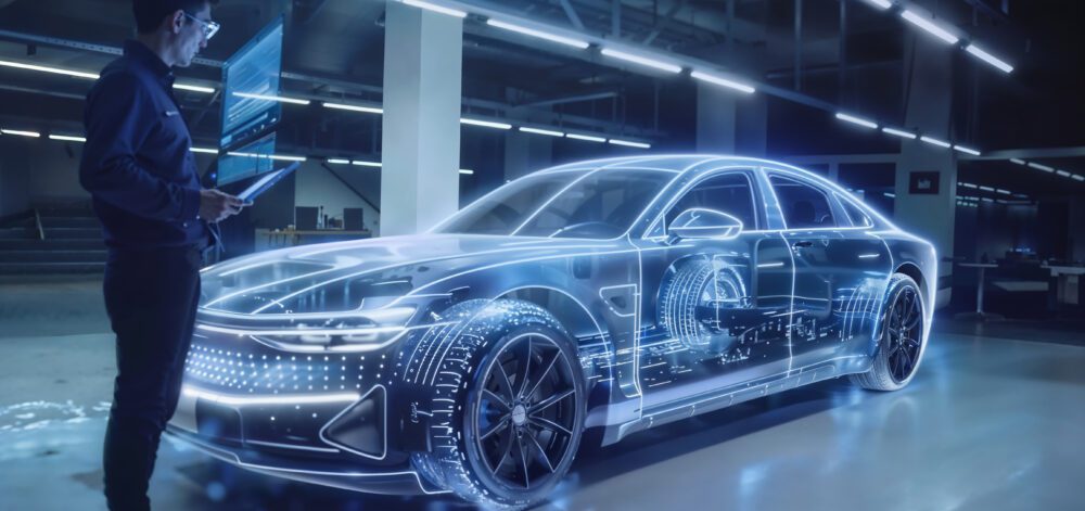 Engineer uses augmented reality to view a transparent 3D car model with visible internal components. They stand in a modern home setting, holding a tablet.