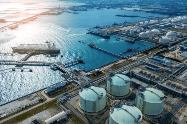 Aerial view of a costal LNG plant with tanker