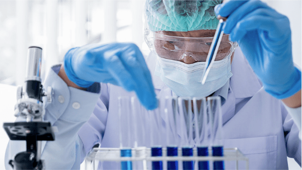 R&D chemist working with test tubes 