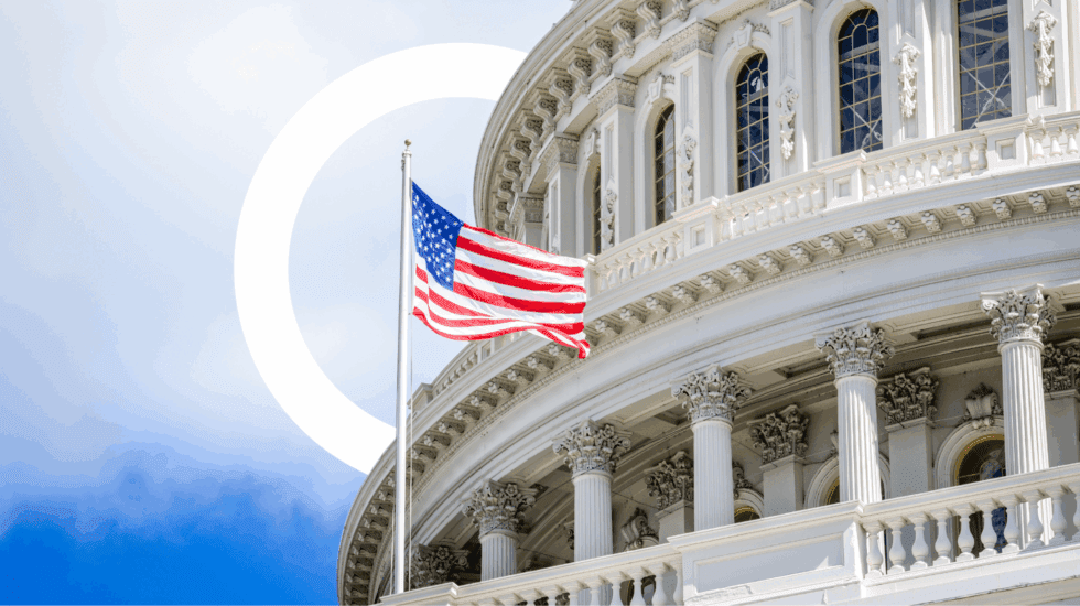 USA Capital building in Washington D.C. with American flag flying.
